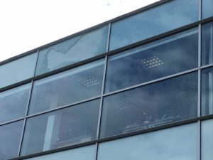 Broken window on the top storey at the Lakeside Doncaster
